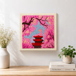 Finished cherry blossom and red pagoda artwork displayed on a wall