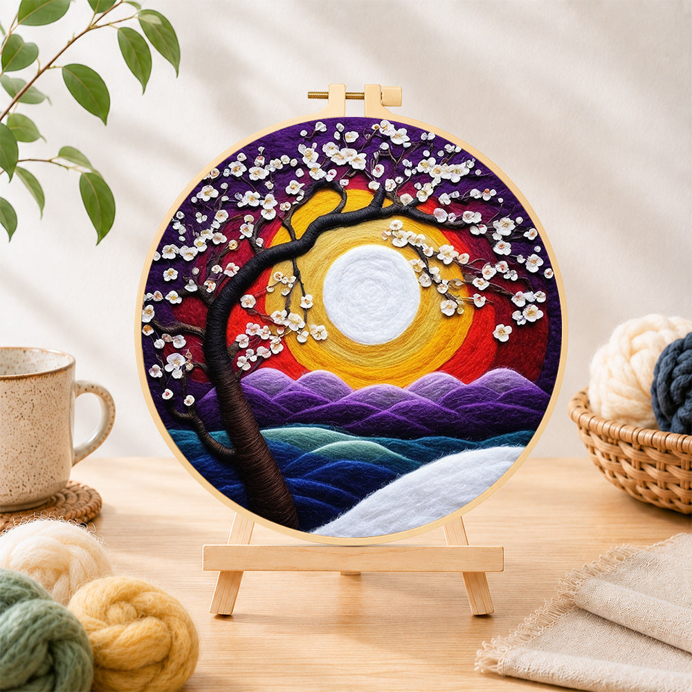 Finished cherry tree at sunset needle felting displayed on a wooden easel