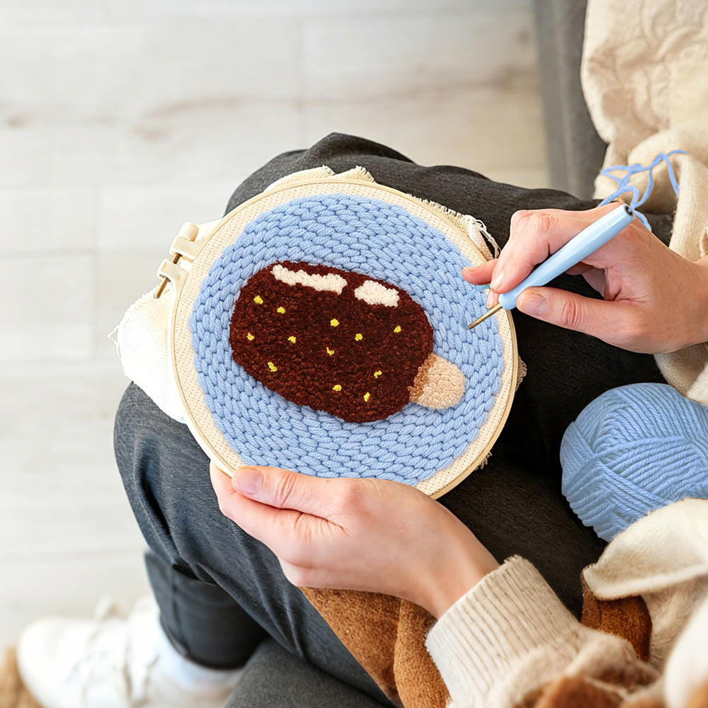 Creating handmade chocolate ice cream punch needle artwork