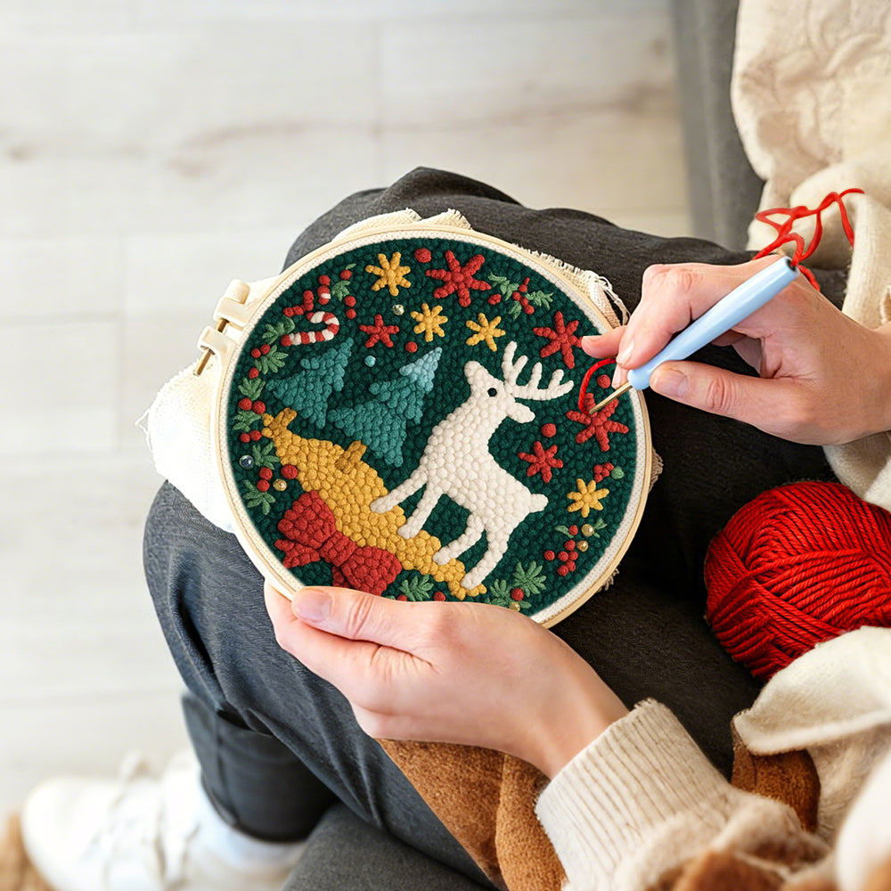 Creating handmade christmas decorations and reindeer punch needle artwork