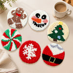 Christmas gingerbread and snowman punch needle coasters used for home decoration