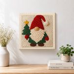 Finished christmas gnome and tree artwork displayed on a wall