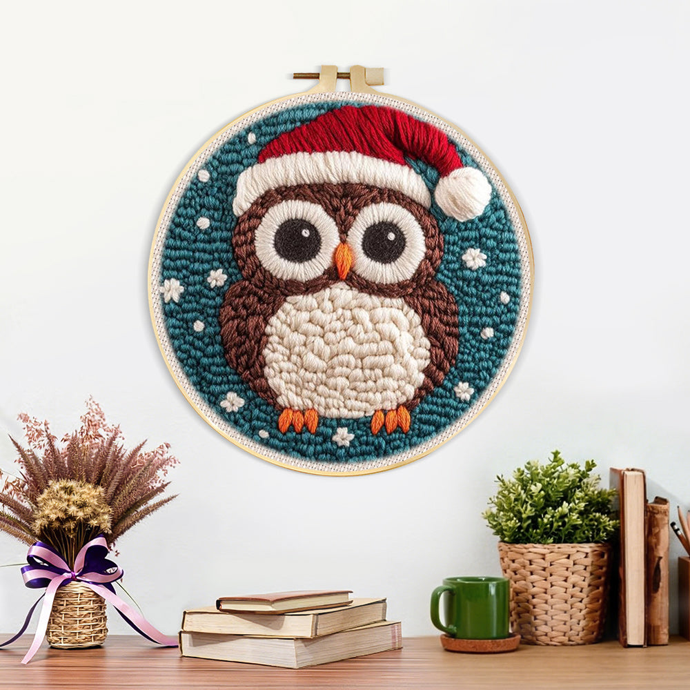 Finished christmas owl artwork displayed on a wall