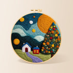 christmas tree and winter village needle felting kit for beginners with a round wooden frame