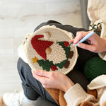 Creating handmade christmas tree gnome punch needle artwork
