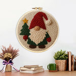 Finished christmas tree gnome artwork displayed on a wall