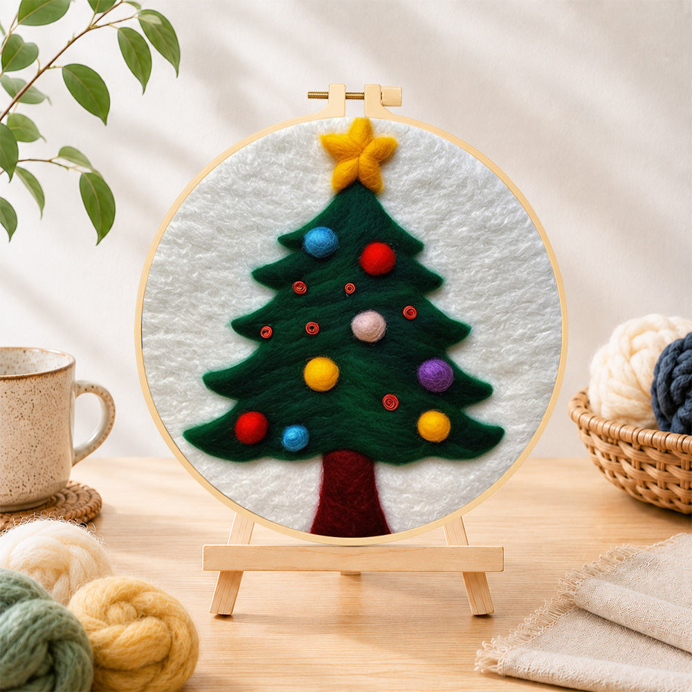 Finished christmas tree with colourful baubles needle felting displayed on a wooden easel