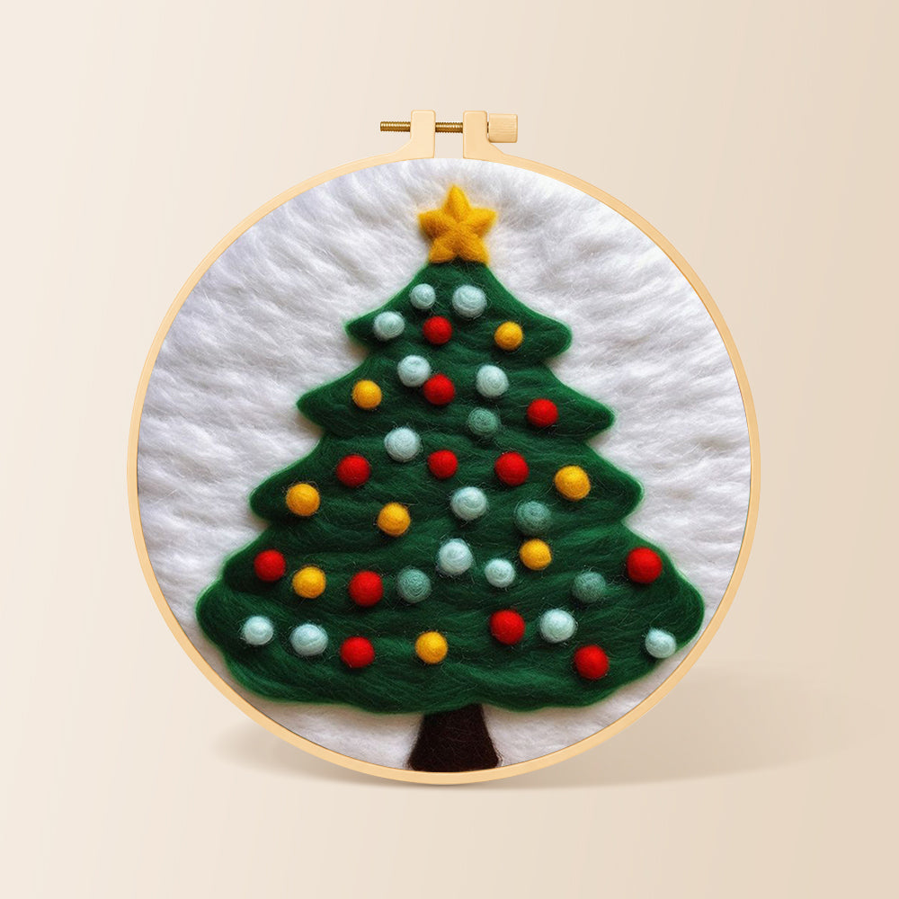 Christmas tree with lots of bright baubles needle felting kit for beginners with a round wooden frame