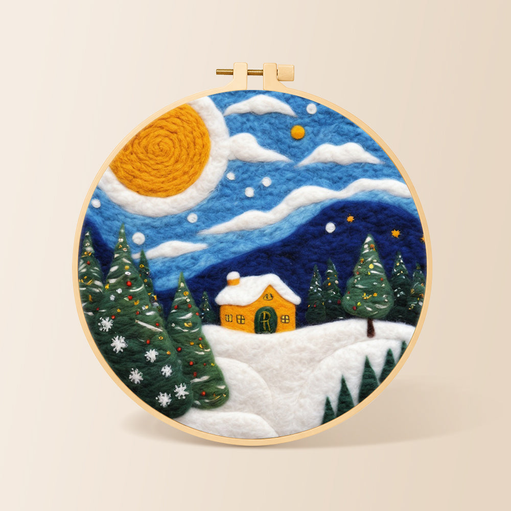 Christmas trees and a yellow cottage needle felting kit for beginners with a round wooden frame