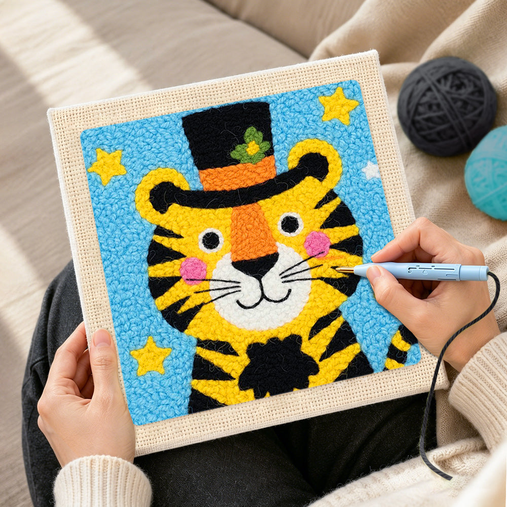 Creating handmade circus tiger with stars and hat punch needle artwork