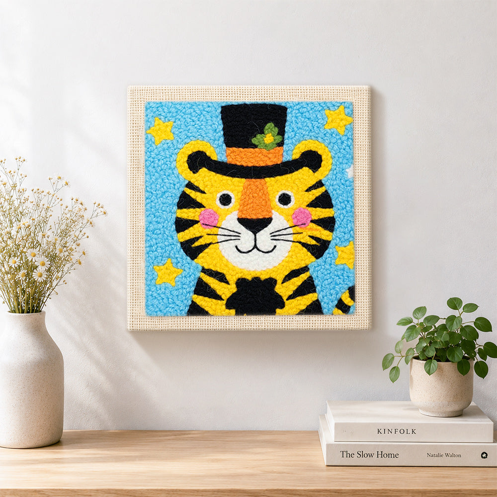 Finished circus tiger with stars and hat artwork displayed on a wall