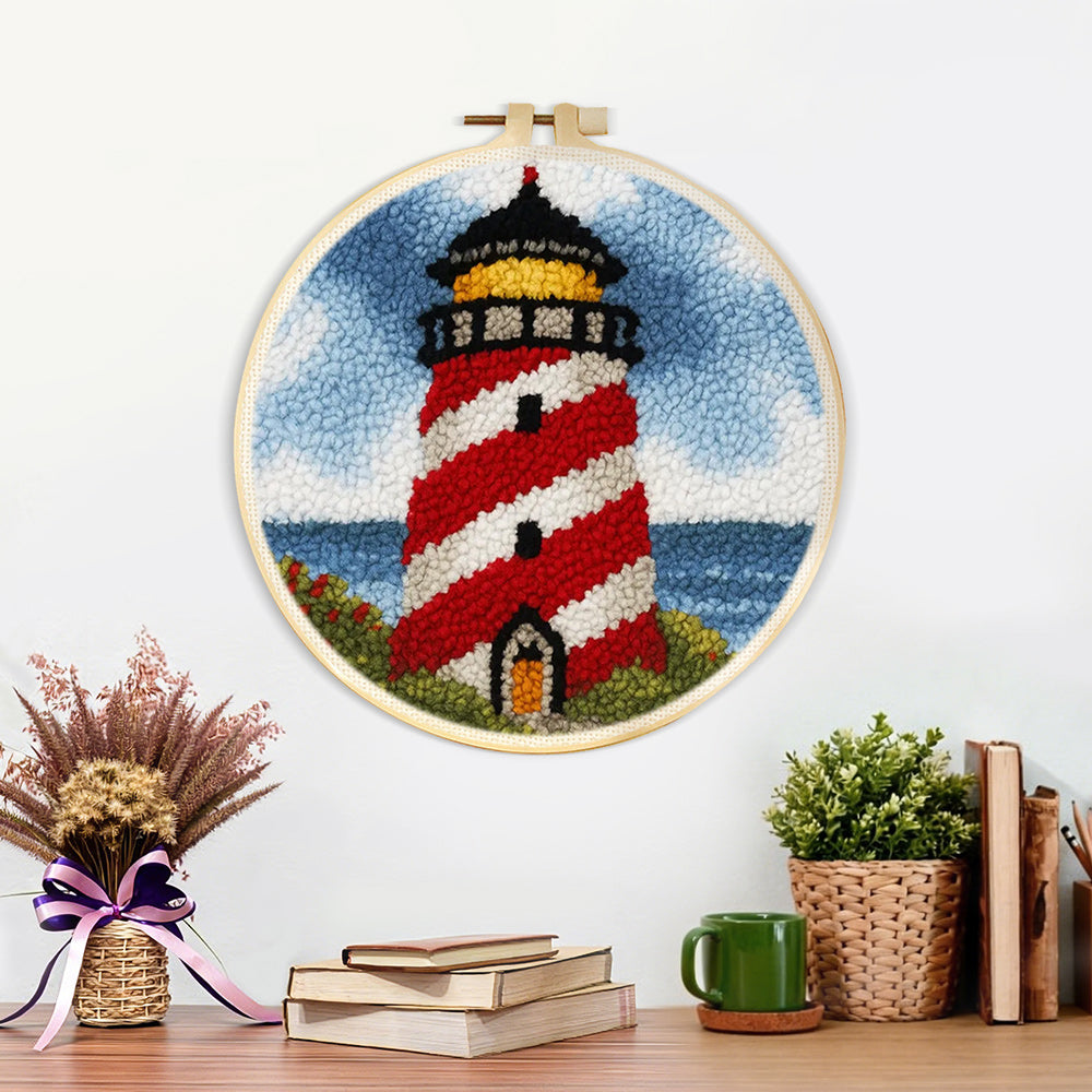 Finished classic red and white striped lighthouse artwork displayed on a wall