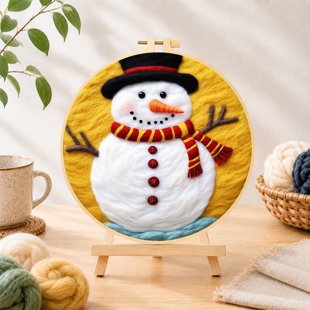 Finished classic red and yellow striped scarf snowman needle felting displayed on a wooden easel