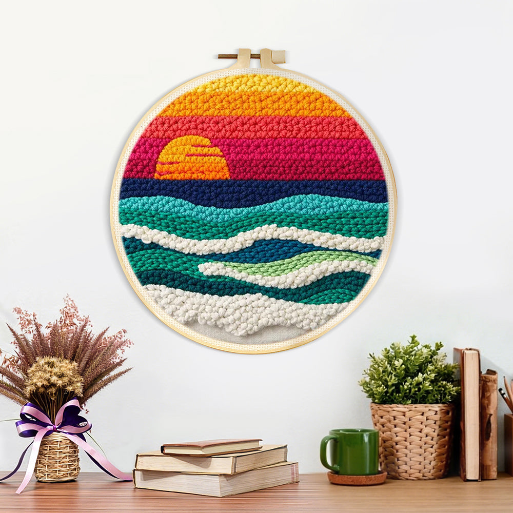 Finished coastal sunset ocean artwork displayed on a wall
