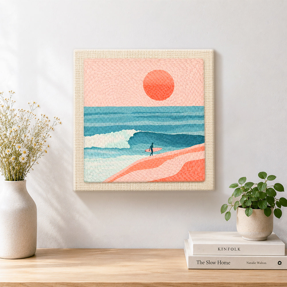 Finished coastal surfer and peach sunset scene artwork displayed on a wall