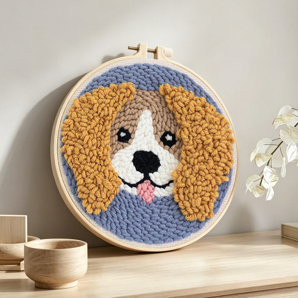 Cocker spaniel punch needle artwork displayed on a table
