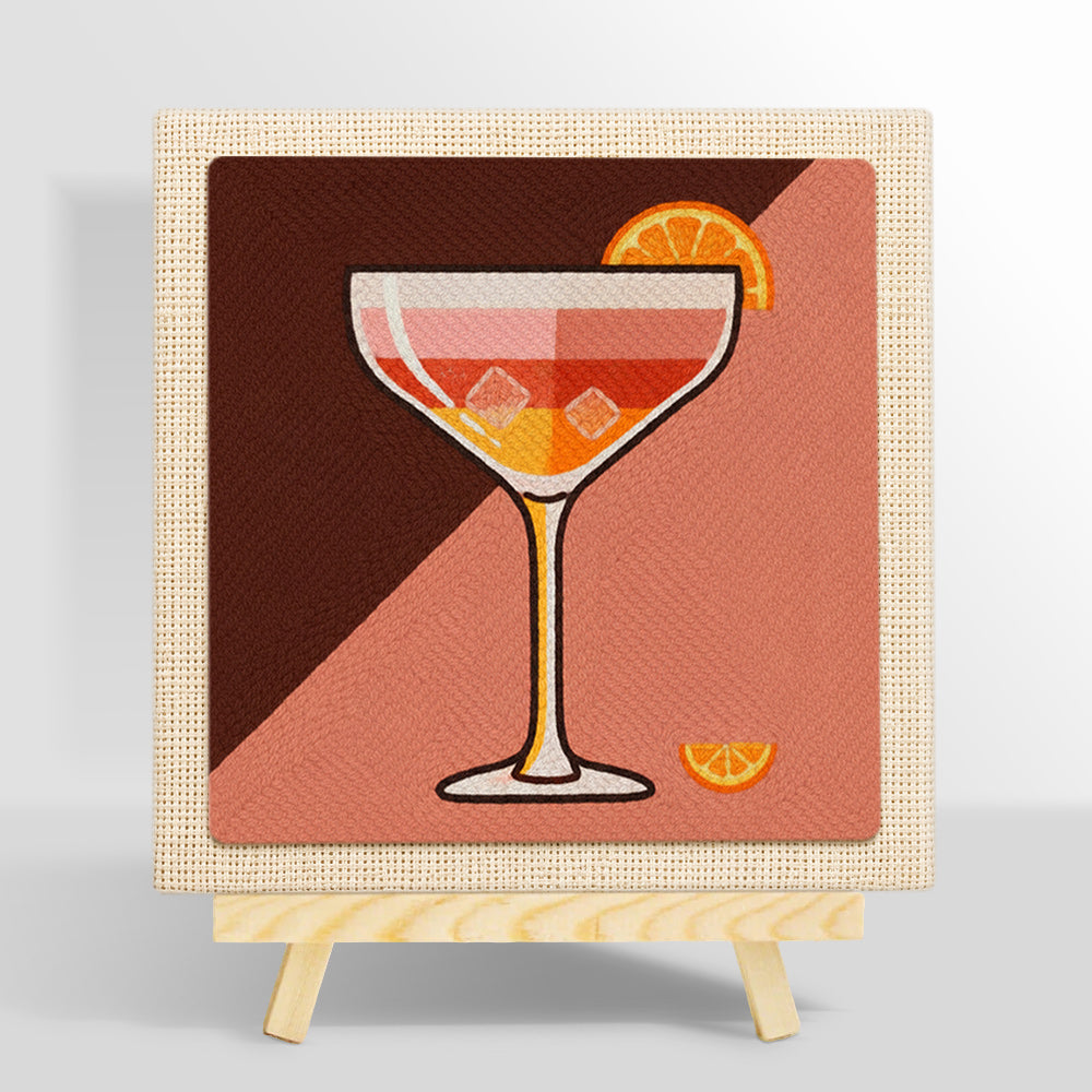 Cocktail with ice and orange slice punch needle kit for beginners