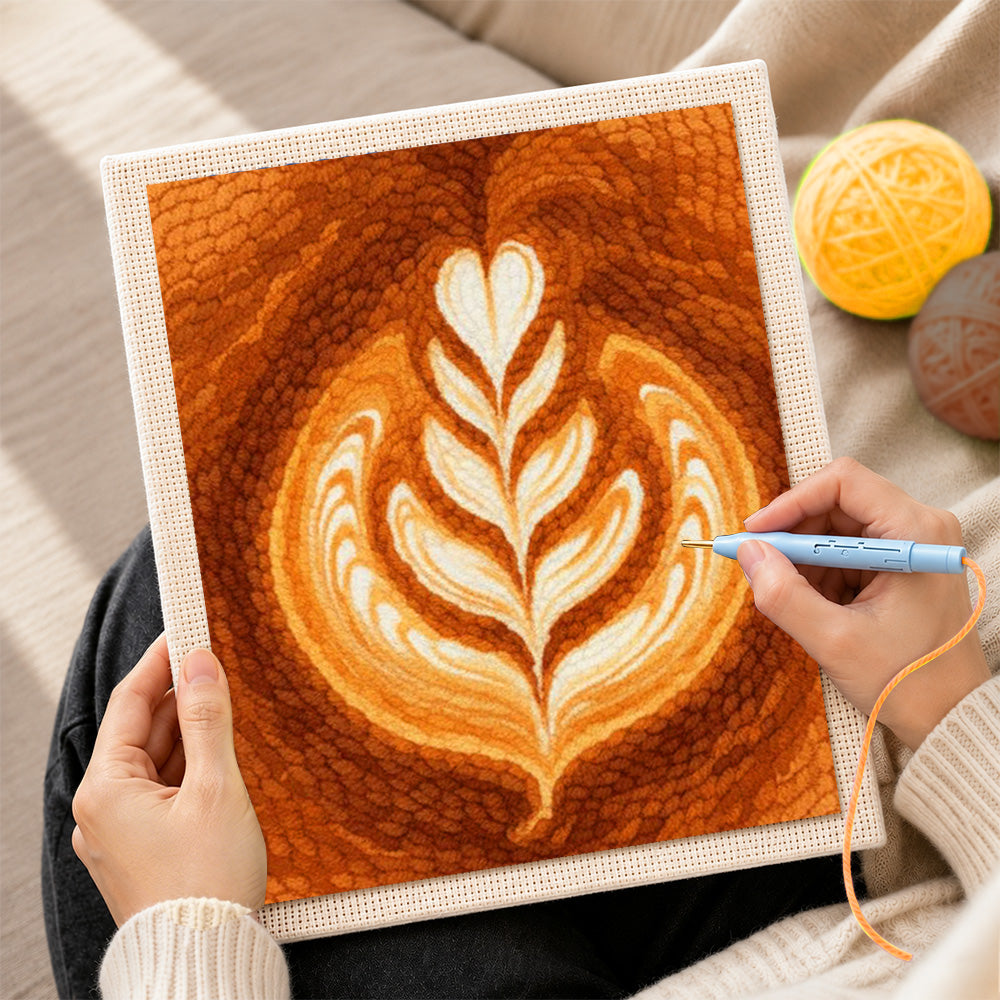 Creating handmade coffee with leaf pattern latte art punch needle artwork