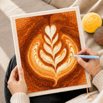 Creating handmade coffee with leaf pattern latte art punch needle artwork