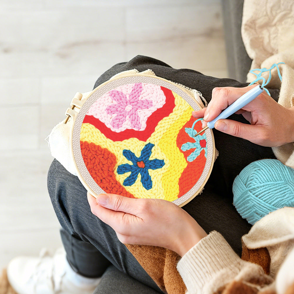 Creating handmade colourful abstract flowers punch needle artwork