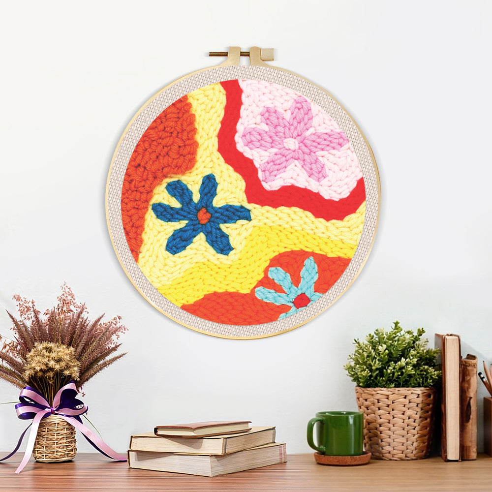 Finished colourful abstract flowers artwork displayed on a wall