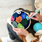 Creating handmade colourful abstract trees punch needle artwork