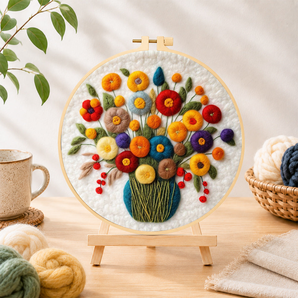 Finished colourful bouquet with berries needle felting displayed on a wooden easel