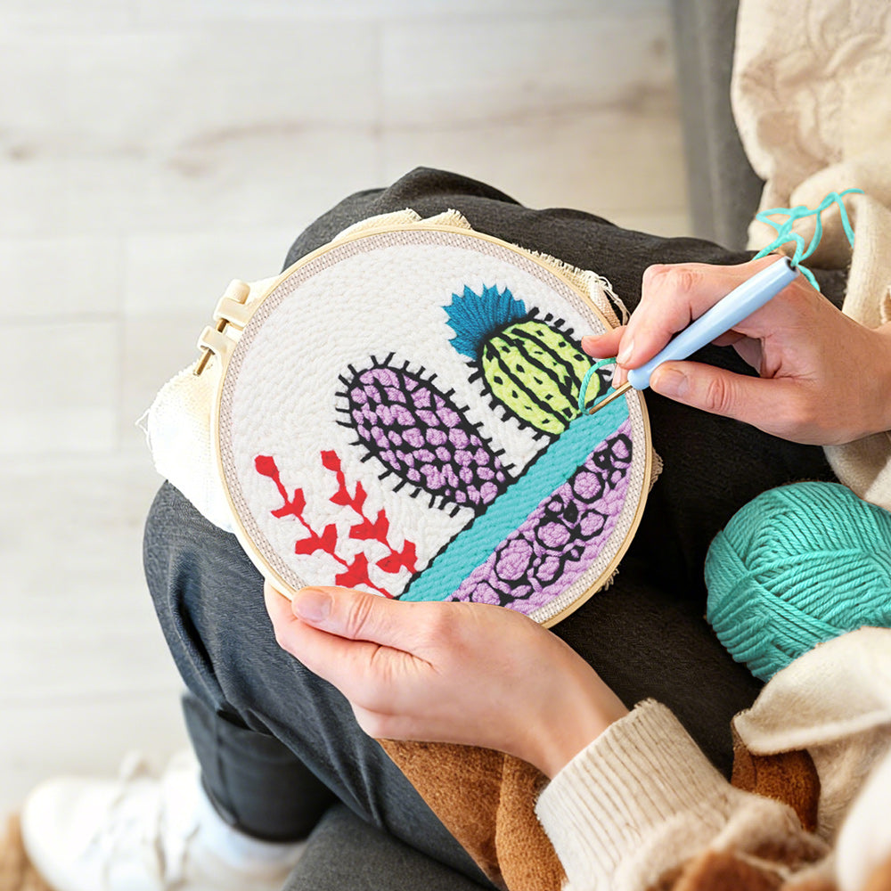 Creating handmade colourful cactus trio punch needle artwork