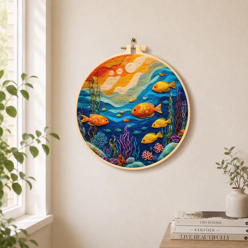 Colourful deep-sea fish needle felt wall art displayed in a bright home interior