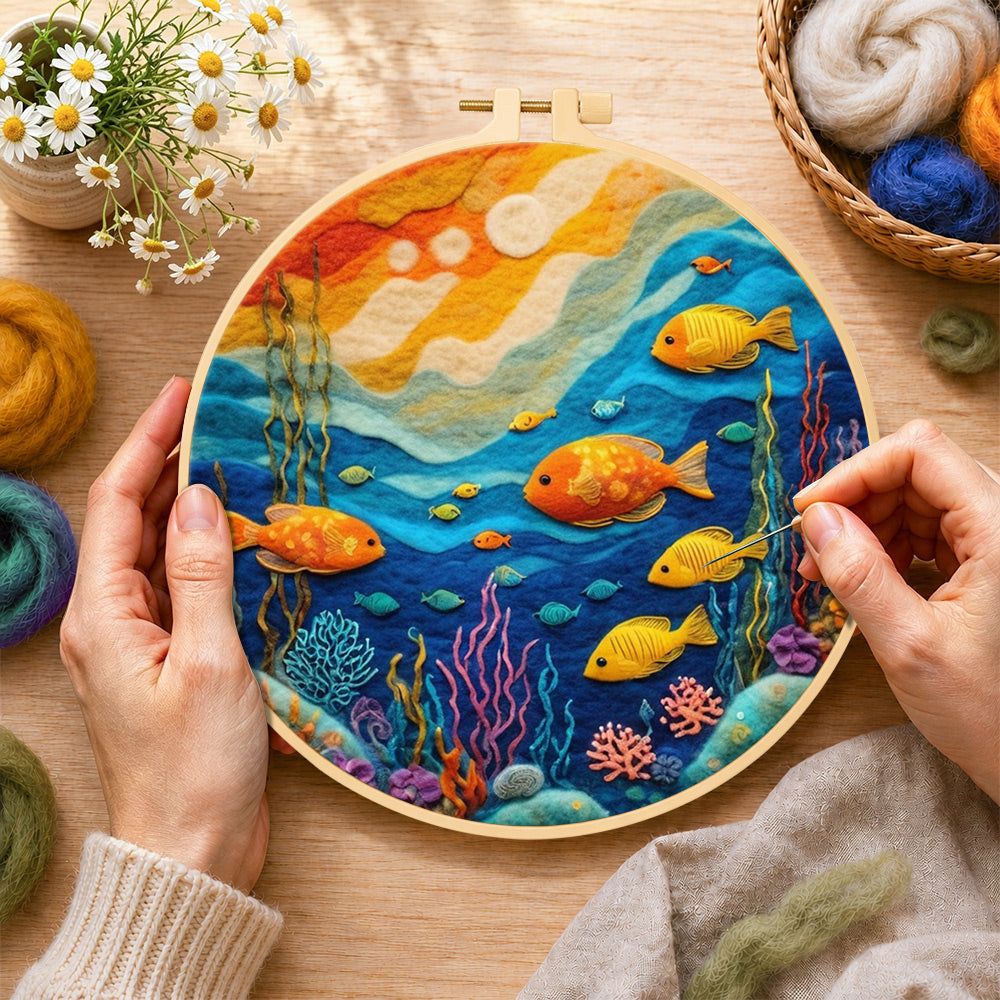 Creating the colourful deep-sea fish wool painting by hand with a felting needle