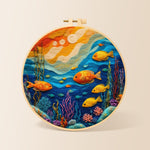 Colourful deep-sea fish needle felting kit for beginners with a round wooden frame