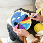 Creating handmade colourful floral field punch needle artwork