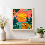 Finished colourful jungle sunset with owl artwork displayed on a wall
