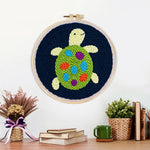 Finished colourful little turtle artwork displayed on a wall