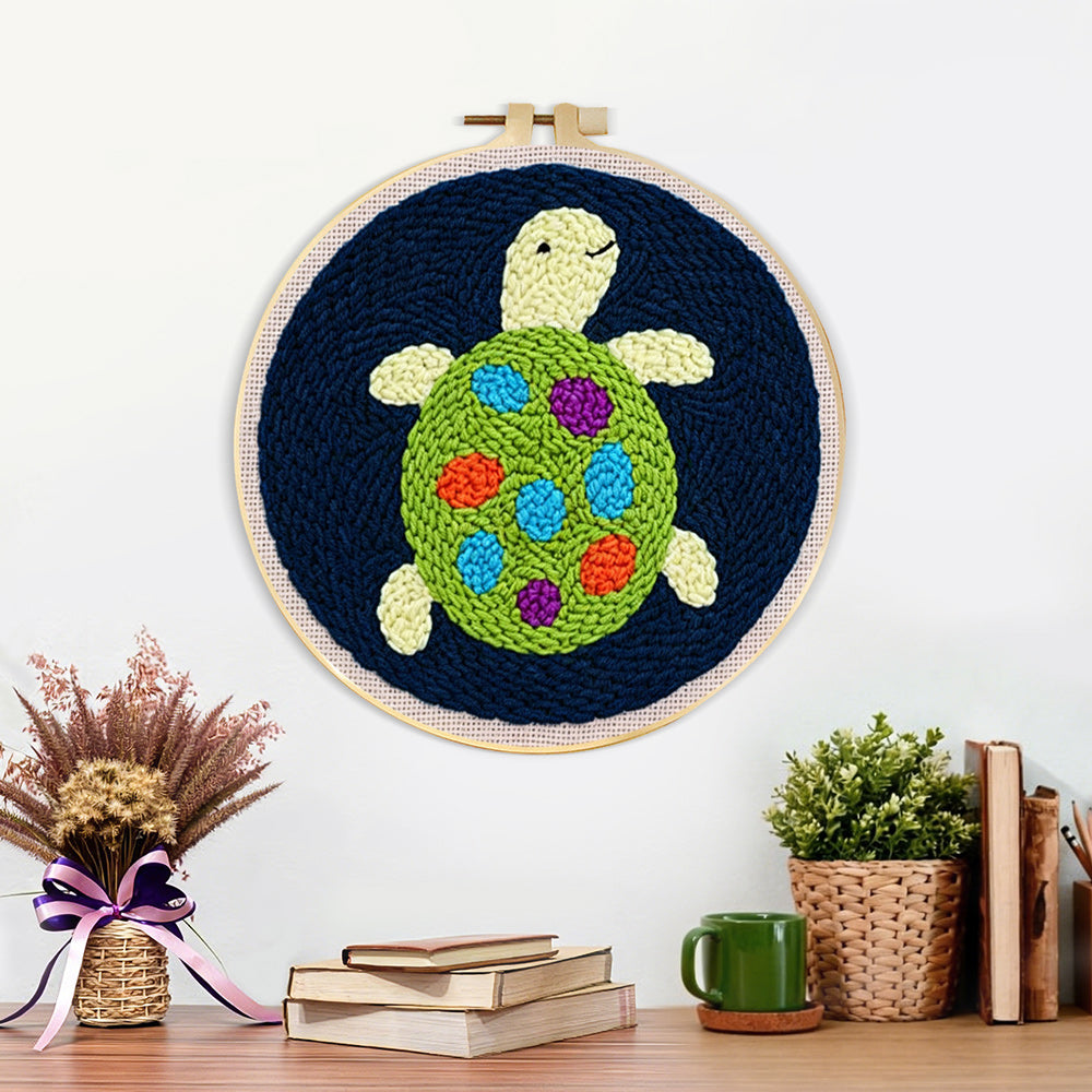 Finished colourful little turtle artwork displayed on a wall