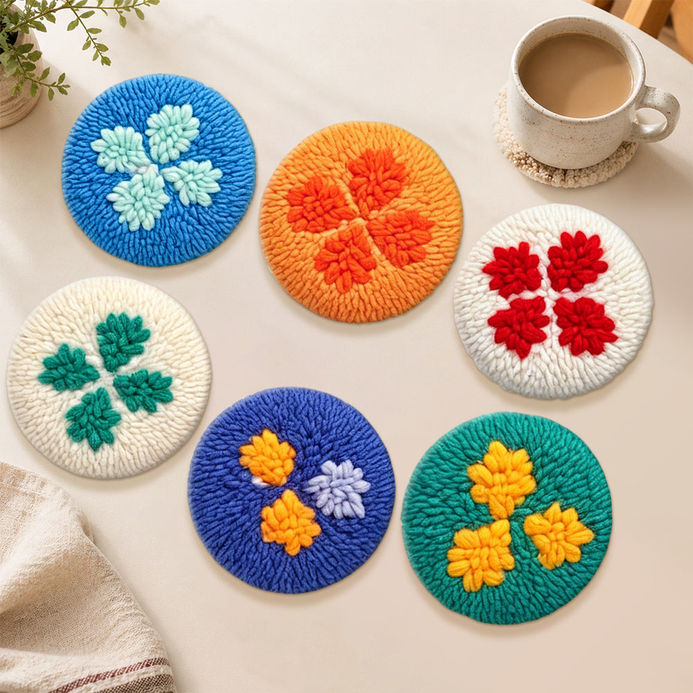 Colourful lucky four-leaf clover punch needle coasters used for home decoration