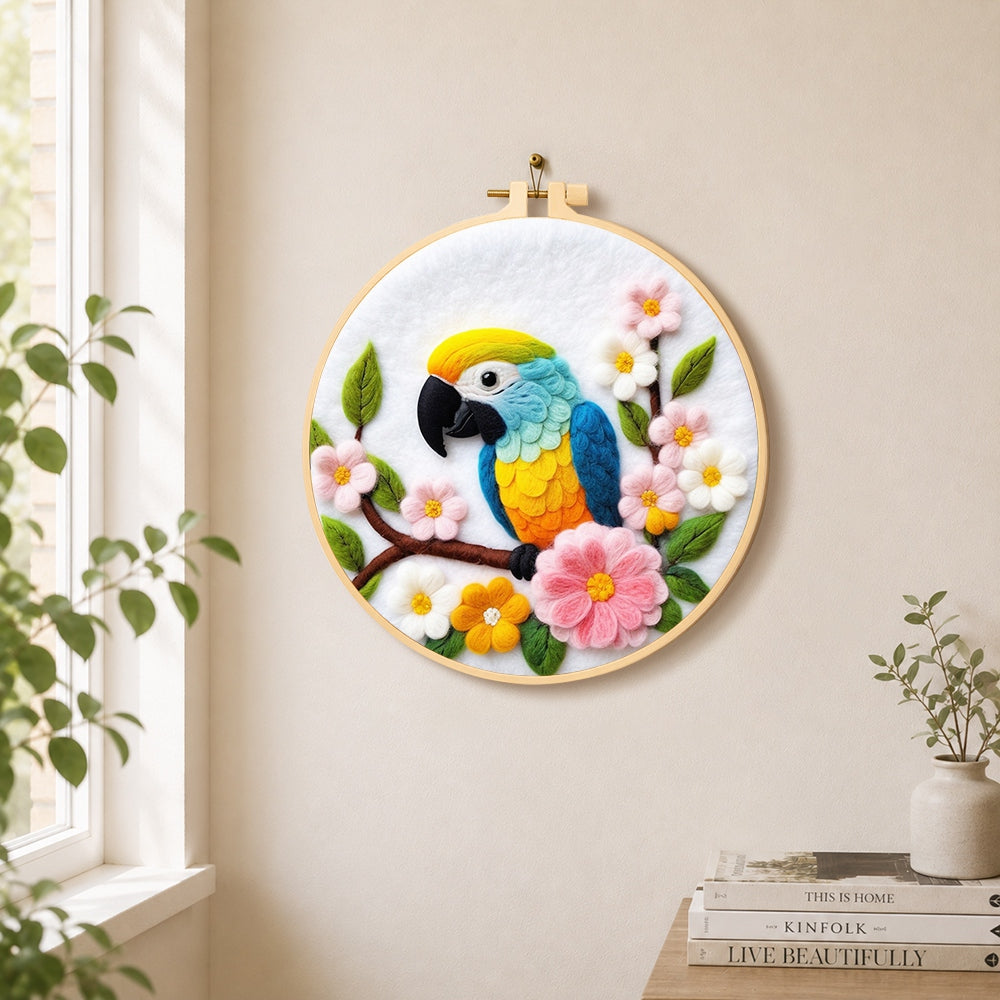 Colourful macaw parrot with flowers needle felt wall art displayed in a bright home interior