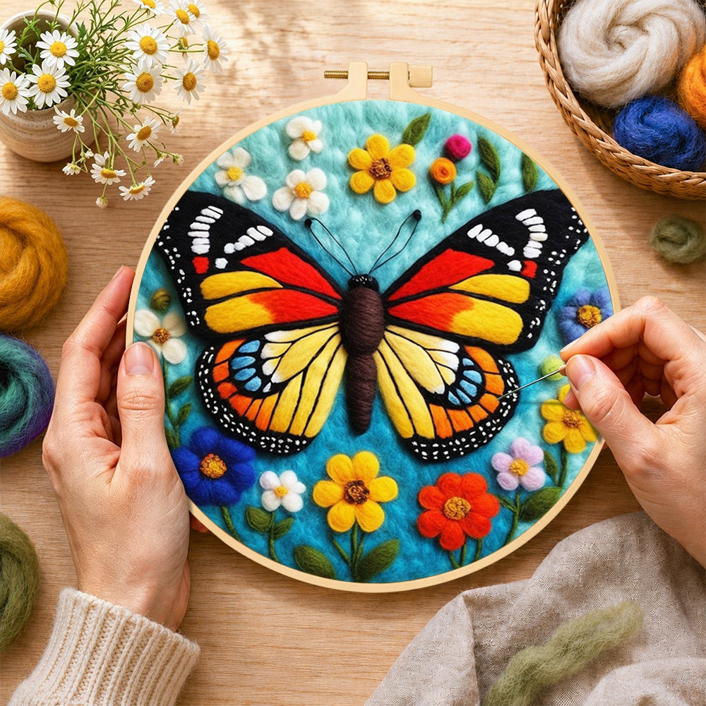 Creating the colourful monarch butterfly and wildflowers wool painting by hand with a felting needle