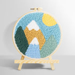 Colourful mountain landscape with sun punch needle kit for beginners