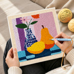 Creating handmade colourful pear and vase still life punch needle artwork
