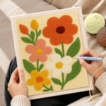 Creating handmade colourful petal flowers punch needle artwork