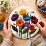 Creating the colourful poppies wool painting by hand with a felting needle