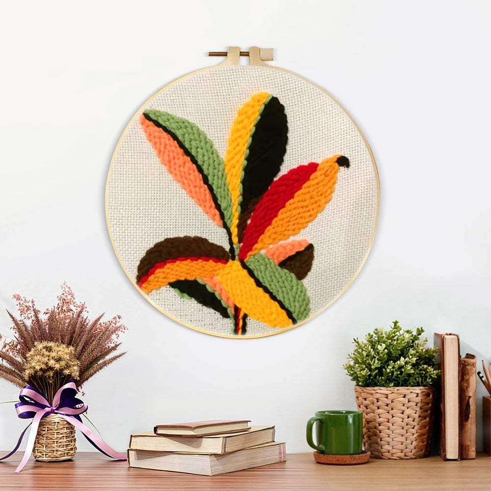 Finished colourful radial leaves artwork displayed on a wall