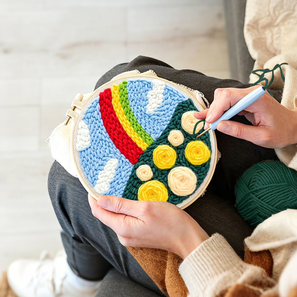 Creating handmade colourful rainbow with yellow roses punch needle artwork