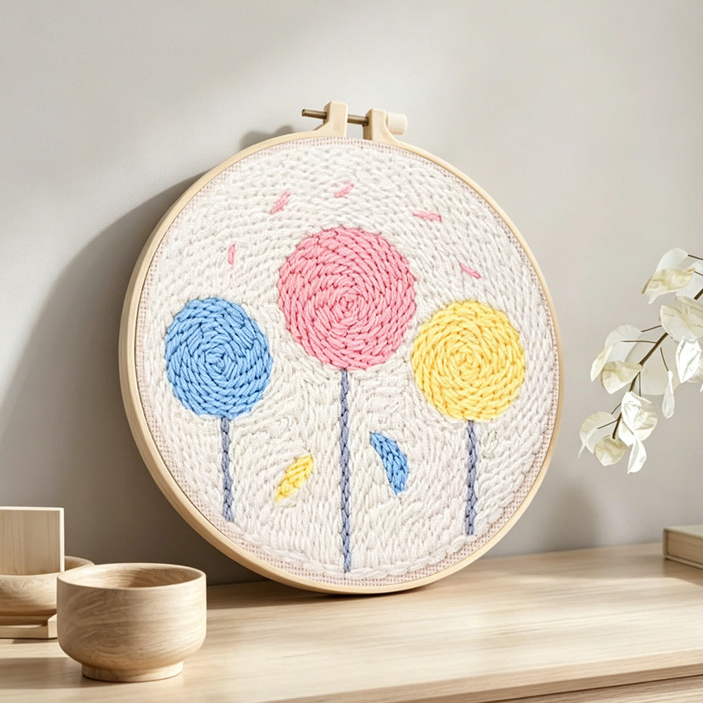 Colourful round flowers punch needle artwork displayed on a table