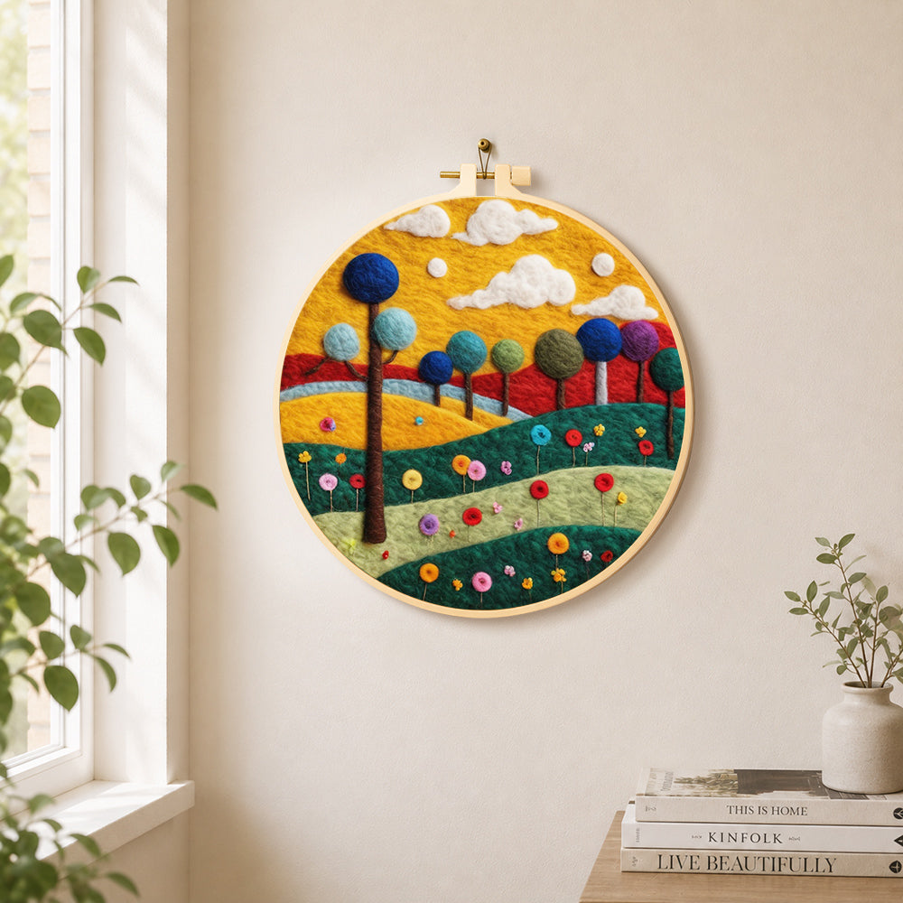 Colourful round trees on whimsical hills needle felt wall art displayed in a bright home interior