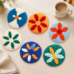 Colourful starburst leaves punch needle coasters used for home decoration
