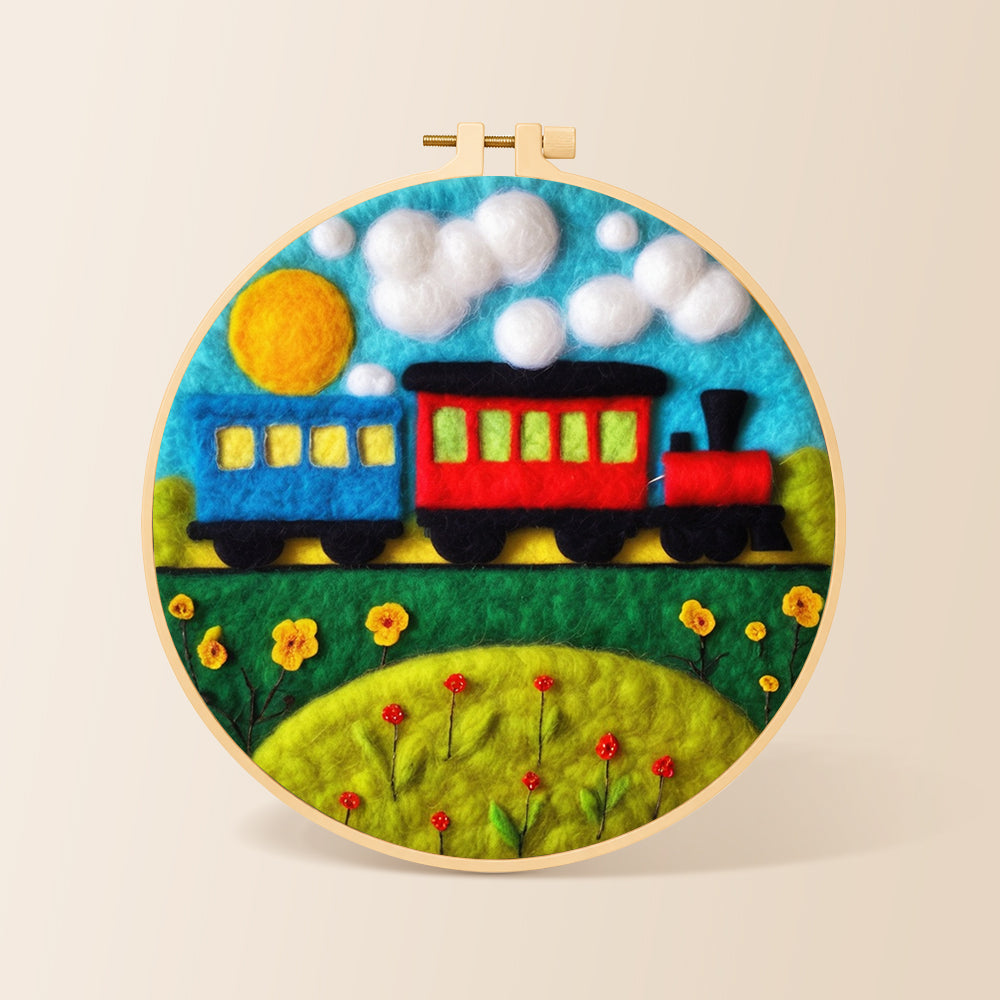 Colourful train on grass needle felting kit for beginners with a round wooden frame