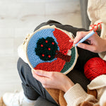 Creating handmade colourful tree with red beads punch needle artwork
