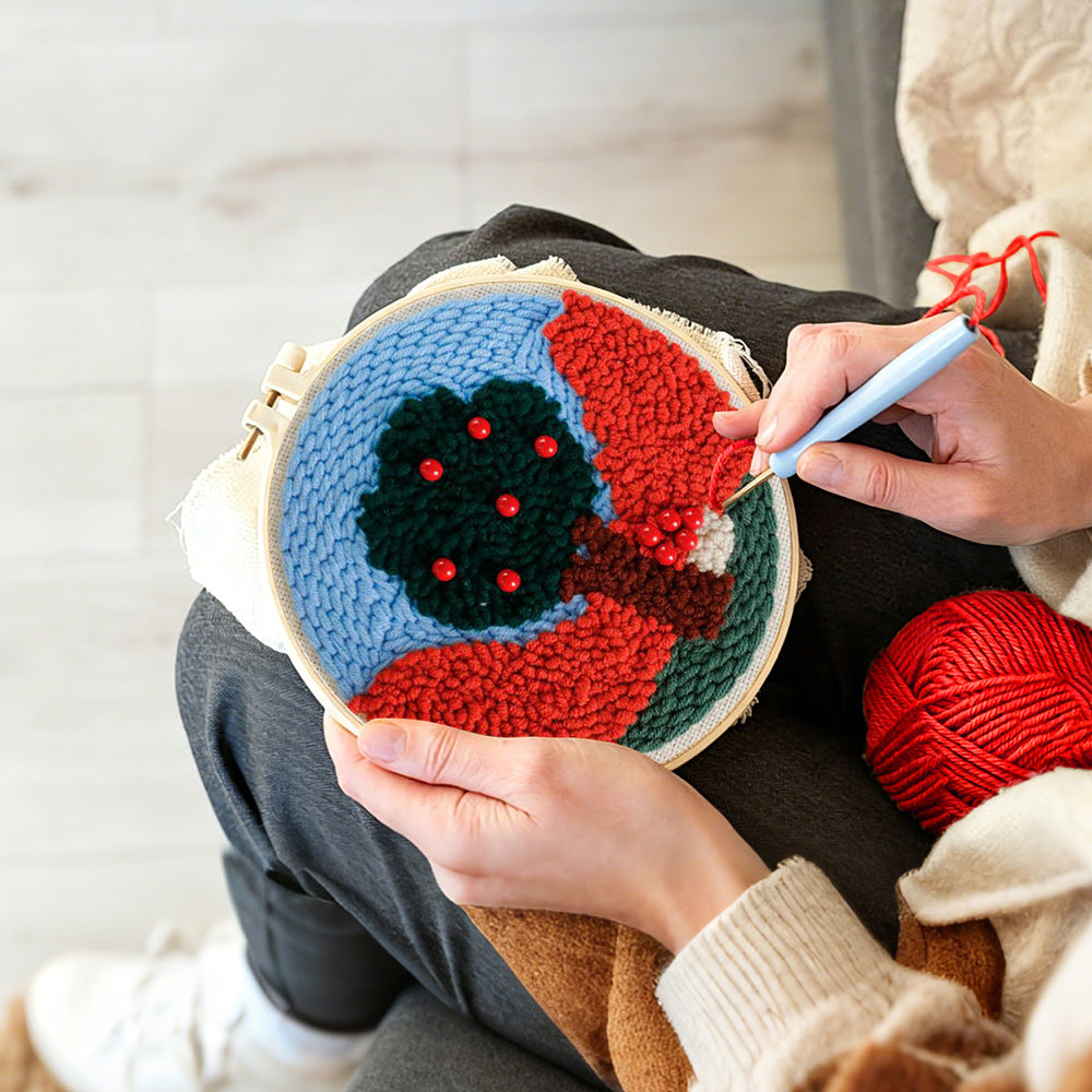 Creating handmade colourful tree with red beads punch needle artwork